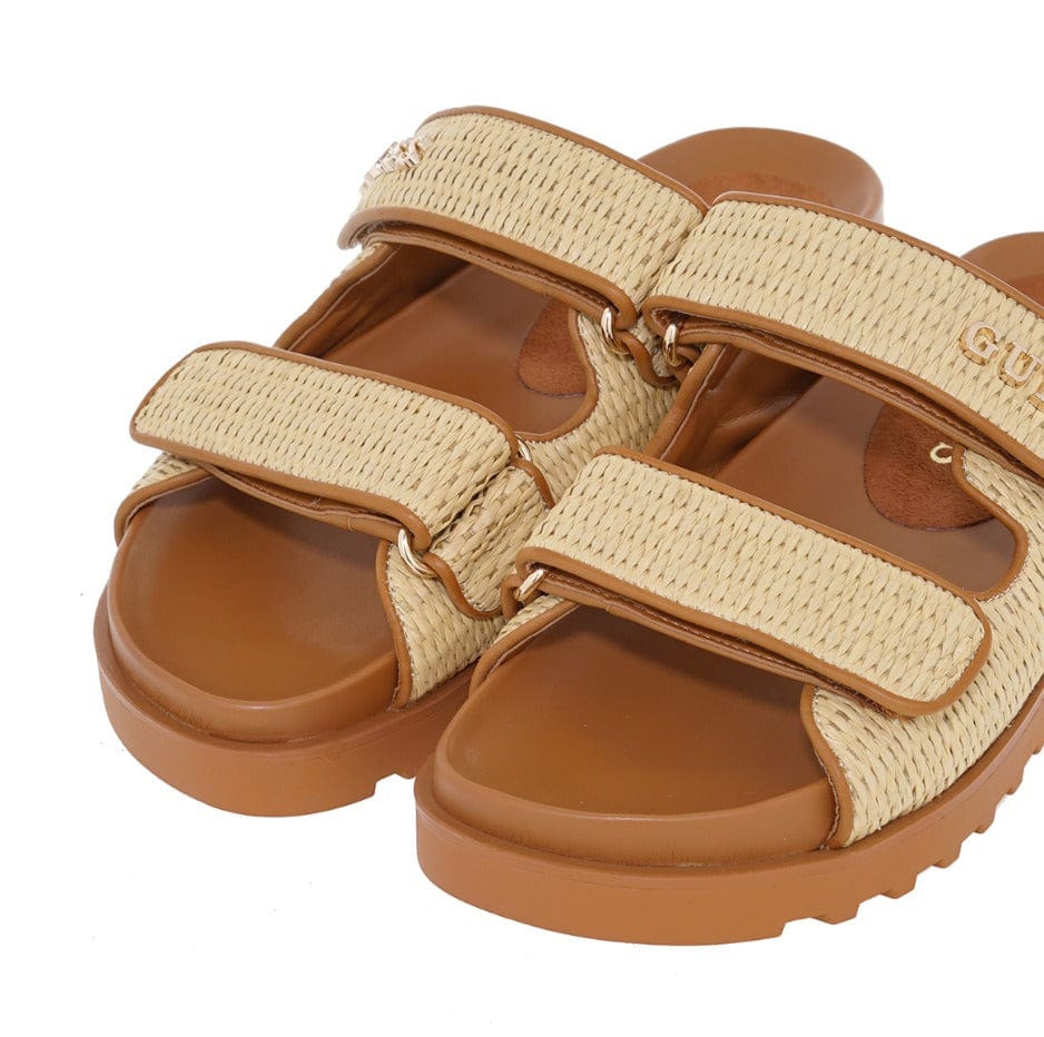 Γυναικεία Flats Guess FLJFDEFAP19 μπεζ/ταμπά Γυναικεία Flats Guess FLJFDEFAP19 μπεζ/ταμπά FLAT SANDALS Guess shoes